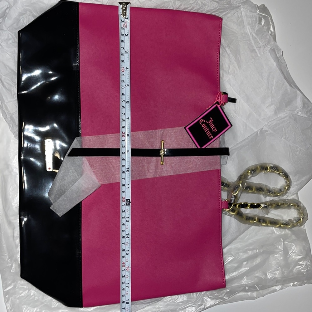Juicy Couture pink and black tote with gold link straps. NWT.
